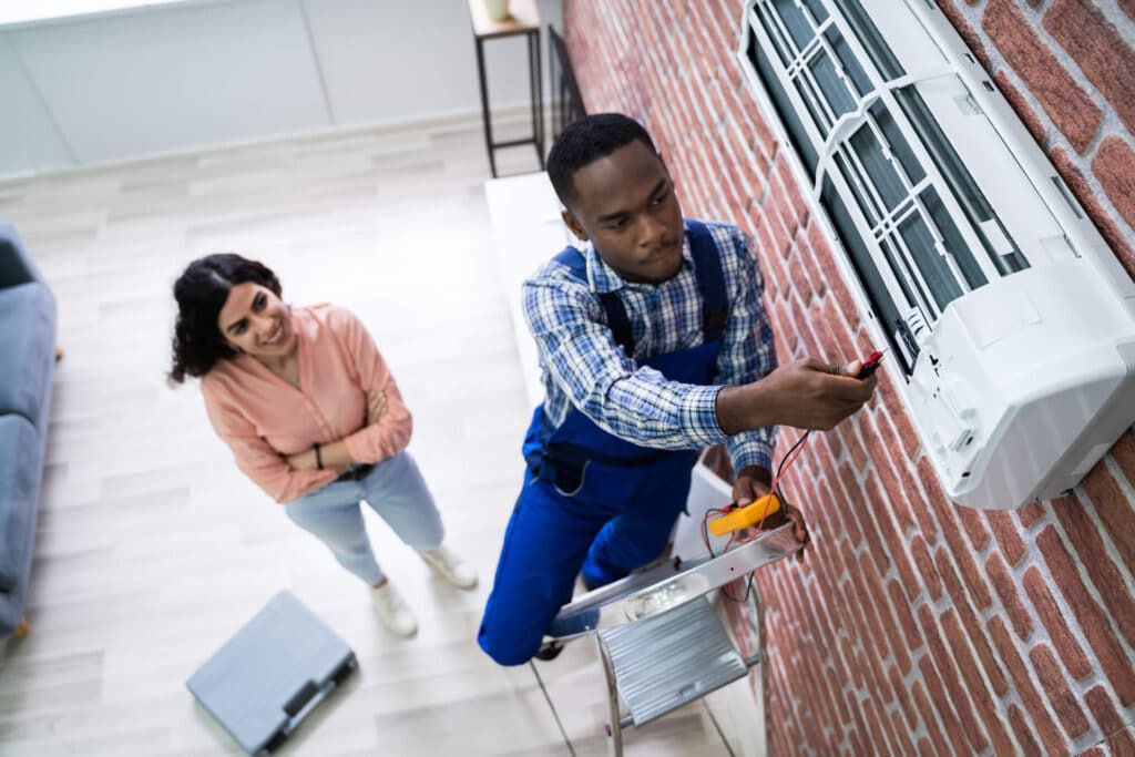 Learn the benefits of each investment property class Los Angeles repairman fixing up class b investment property
