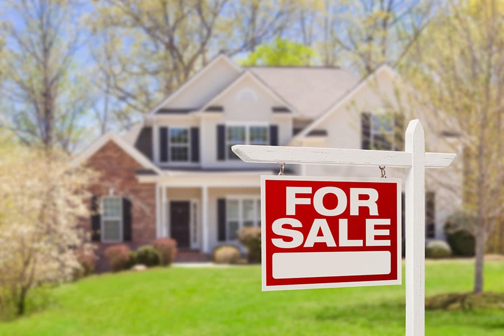 A potential investment opportunity Bell, California family house with for sale sign in front yard